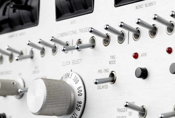 Toggle switches on the front panel of an instrument