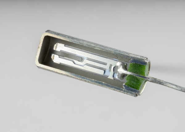 The tuning-fork quartz crystal from a wristwatch