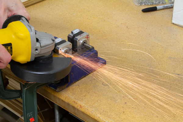 Cutting open a stepper motor with an angle grinder. (Outtake)