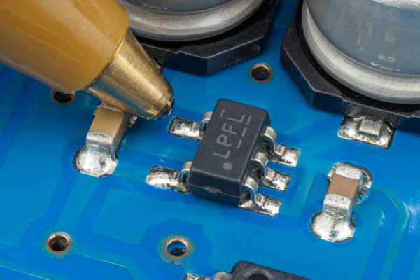 SOT-23-5 IC on a circuit board. (Outtake)